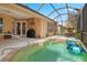 Enjoy this refreshing pool with a covered patio at 4410 Turnberry Cir, North Port, FL 34288