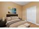 Cozy bedroom with a queen-size bed and built-in closet at 4410 Turnberry Cir, North Port, FL 34288