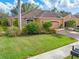 Beautiful one-story home with a well-maintained lawn at 4410 Turnberry Cir, North Port, FL 34288