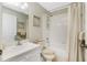 Clean bathroom with a tub, shower, and updated vanity at 19310 Water Oak Dr # 203, Port Charlotte, FL 33948