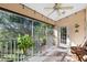 Bright screened porch, perfect for relaxing and enjoying the outdoors at 19310 Water Oak Dr # 203, Port Charlotte, FL 33948