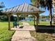 Quaint gazebo overlooking the lake at 19310 Water Oak Dr # 203, Port Charlotte, FL 33948