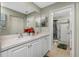 Double vanity bathroom with a separate shower and tub at 19310 Water Oak Dr # 203, Port Charlotte, FL 33948