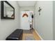 Light and bright entryway with seating and decor at 19310 Water Oak Dr # 203, Port Charlotte, FL 33948