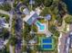 Aerial view of community amenities including pool and tennis at 19310 Water Oak Dr # 203, Port Charlotte, FL 33948