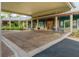 Community clubhouse entrance with bike racks at 19310 Water Oak Dr # 203, Port Charlotte, FL 33948