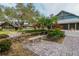 Relaxing courtyard with fountain and seating at 19310 Water Oak Dr # 203, Port Charlotte, FL 33948