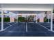 Designated parking area with covered carport at 19310 Water Oak Dr # 203, Port Charlotte, FL 33948
