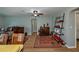 Dining room with a wooden table and chairs and a view to the backyard at 22532 Ashton Ave, Punta Gorda, FL 33980