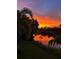 Stunning sunset reflecting on the canal at 22532 Ashton Ave, Punta Gorda, FL 33980