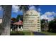 Community entrance sign with directions to various amenities at 25188 Marion Ave # B309, Punta Gorda, FL 33950