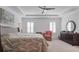 Main bedroom with sitting area and large windows at 2705 Lamkin Rd, North Port, FL 34288
