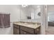 Double vanity bathroom with granite countertops at 2705 Lamkin Rd, North Port, FL 34288