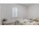 Guest bedroom with twin beds and plenty of natural light at 2705 Lamkin Rd, North Port, FL 34288