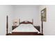 Bedroom with a wooden bed frame and nightstands at 2705 Lamkin Rd, North Port, FL 34288