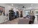 Living room with large TV and comfortable seating at 2705 Lamkin Rd, North Port, FL 34288