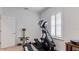 Spacious home gym featuring an elliptical and rowing machine at 2705 Lamkin Rd, North Port, FL 34288