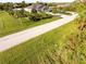 One-story home with pool and landscaped yard at 2705 Lamkin Rd, North Port, FL 34288