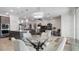 Open kitchen features island and breakfast bar at 2705 Lamkin Rd, North Port, FL 34288