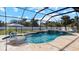 Relaxing pool area with covered patio, spa, and water features at 2705 Lamkin Rd, North Port, FL 34288