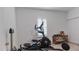 Bright home gym with elliptical, rowing machine, and weight bench at 2705 Lamkin Rd, North Port, FL 34288