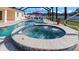 Spa and pool with a relaxing atmosphere at 2705 Lamkin Rd, North Port, FL 34288