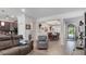 Open concept living room, kitchen, and dining area at 2705 Lamkin Rd, North Port, FL 34288