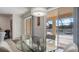 Bright dining area with glass table and view of the pool at 2705 Lamkin Rd, North Port, FL 34288