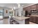 Modern kitchen with stainless steel appliances and granite countertops at 2705 Lamkin Rd, North Port, FL 34288