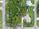 Aerial view of property showing house, landscaping, and surrounding neighborhood at 4290 Randypaar St, Port Charlotte, FL 33948