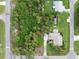 Aerial view of property showing house, landscaping, and surrounding neighborhood at 4290 Randypaar St, Port Charlotte, FL 33948