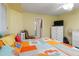 Bedroom with king-size bed, dresser, and access to bathroom at 4290 Randypaar St, Port Charlotte, FL 33948