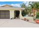 The house has a double car garage with screen doors at 4290 Randypaar St, Port Charlotte, FL 33948