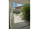 Backyard features a pergola and a stone-covered landscape at 4290 Randypaar St, Port Charlotte, FL 33948