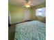Bright bedroom featuring green walls and neutral decor at 4290 Randypaar St, Port Charlotte, FL 33948
