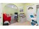 Entryway with view into living room and workspace at 4290 Randypaar St, Port Charlotte, FL 33948