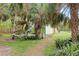 Spacious backyard with shed and tropical plants at 4290 Randypaar St, Port Charlotte, FL 33948