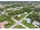 Aerial view showing home's location in a residential neighborhood at 4290 Randypaar St, Port Charlotte, FL 33948