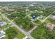 Aerial view showing home's location in a residential neighborhood at 4290 Randypaar St, Port Charlotte, FL 33948