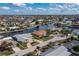 Aerial view of single-Gathering home on a canal at 440 Norma Ct, Punta Gorda, FL 33950