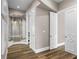 Elegant hallway with wood flooring and neutral walls at 4601 Grassy Point Blvd, Port Charlotte, FL 33952