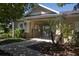 Community center building with gated access and landscaping at 120 Cordana Ct, Venice, FL 34292