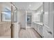 Spa-like bathroom with walk-in shower and double vanity at 16138 Highgate St, Port Charlotte, FL 33953