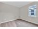 Bright bedroom with neutral walls, carpet, and window at 16138 Highgate St, Port Charlotte, FL 33953