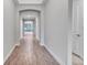 Bright and spacious entryway with wood-look tile flooring at 16138 Highgate St, Port Charlotte, FL 33953