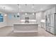 Modern kitchen featuring a large island and stainless steel appliances at 16138 Highgate St, Port Charlotte, FL 33953