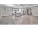 Open concept kitchen with island and stainless steel appliances at 16138 Highgate St, Port Charlotte, FL 33953