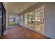 Screened patio with brick pavers and view of the backyard at 16138 Highgate St, Port Charlotte, FL 33953