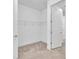 Bright and airy walk-in closet with neutral carpet at 16138 Highgate St, Port Charlotte, FL 33953