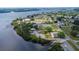 Waterfront community aerial view with tennis courts and docks at 182 Santarem Cir, Punta Gorda, FL 33983